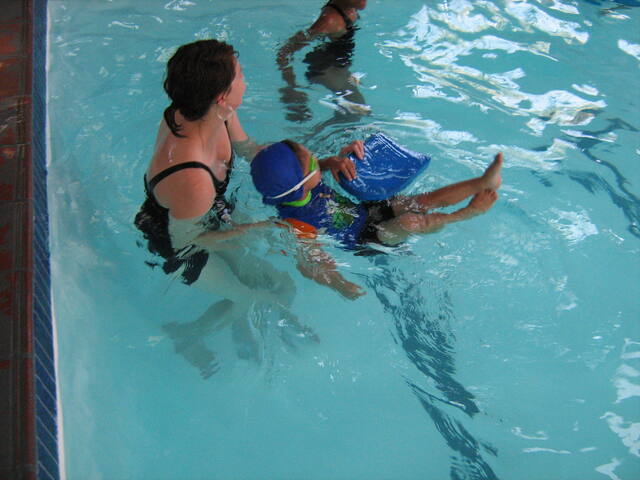 Instructor working with two learners